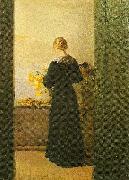 Anna Ancher, en ung pige ordner blomster